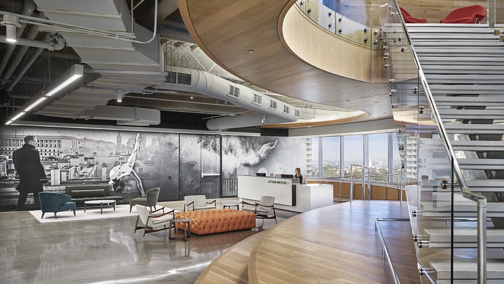 A large room with a large white airplane in it.